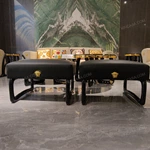 Elegant TV Stand with Upholstered Texture and Gold Metal Base
